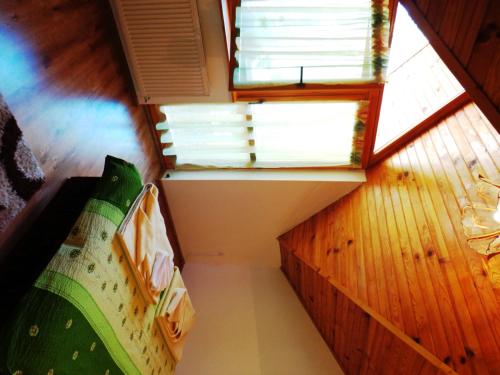 an overhead view of a room with a bed and a window at Penzion Centrum in Sklené Teplice