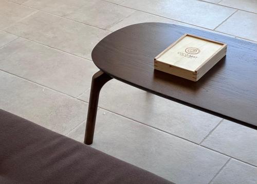 a box sitting on top of a wooden table at Topos luxury stay Heraion in Loutraki