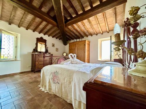 Posteľ alebo postele v izbe v ubytovaní Poggiosalto in Toscana
