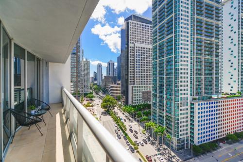 a balcony with a view of a city at Luxurious 1/1 Condo at Icon Brickell W/Pool in Miami