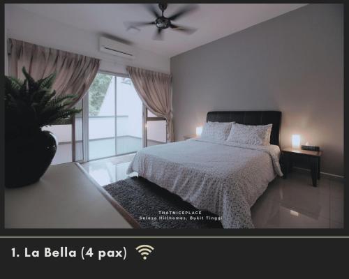 a bedroom with a bed and a ceiling fan at ThatNicePlace, Selesa Hillhomes, Bukit Tinggi, Janda Baik, Genting in Bentong