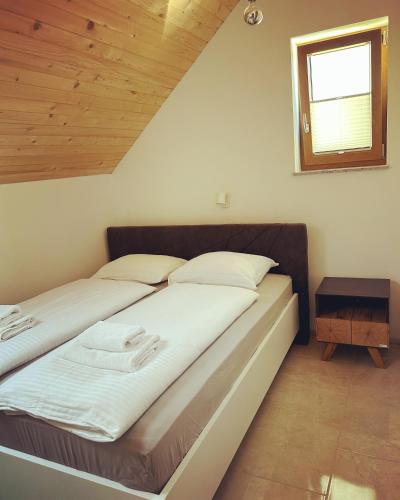 Katil atau katil-katil dalam bilik di ALPS Apartments
