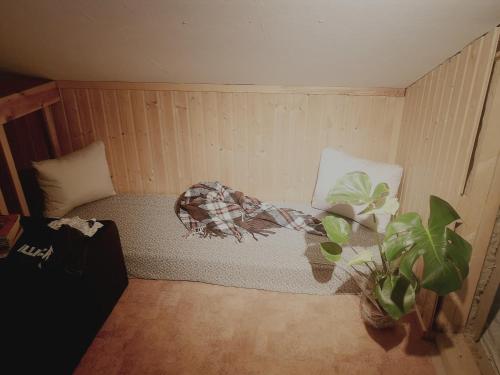 Postel nebo postele na pokoji v ubytování Garret of Valkea