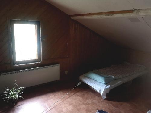 Postel nebo postele na pokoji v ubytování Garret of Valkea