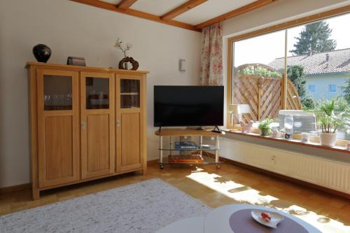 Μια τηλεόραση ή/και κέντρο ψυχαγωγίας στο Ferienhaus Haas inkl. Chiemgaukarte