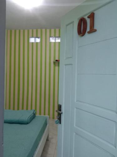 Кровать или кровати в номере AAA, Sukapura Guesthouse, Bromo Mountain View Triple A Tour, 3 Levels, Sukapura, Probolinggo, Additional Jeep Bromo Sunrise by TRIPLE A TOUR