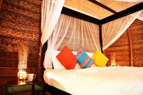 מיטה או מיטות בחדר ב-Palagama Beach Resort