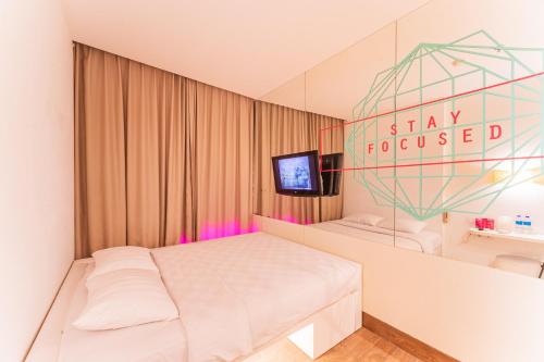 Cama o camas de una habitación en J Icon Hip Hotel