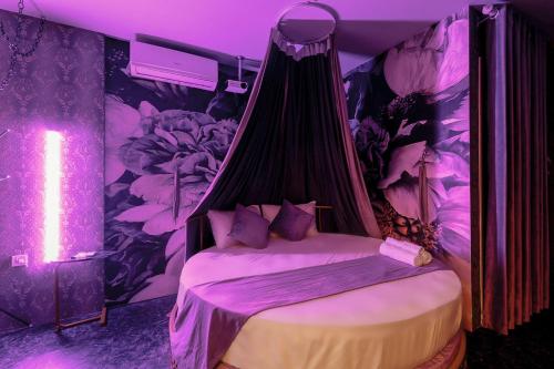 Ένα ή περισσότερα κρεβάτια σε δωμάτιο στο Homstay tình yêu vinhomes oceanpark