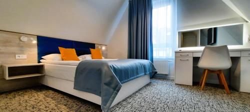 Łóżko lub łóżka w pokoju w obiekcie Apartamenty Wielka Odrzańska Centrum