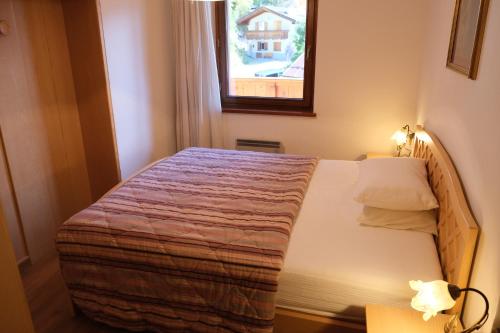 מיטה או מיטות בחדר ב-Anny 15
