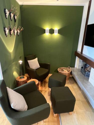 Un lugar para sentarse en Aparthotel Parsberg GreenDesign