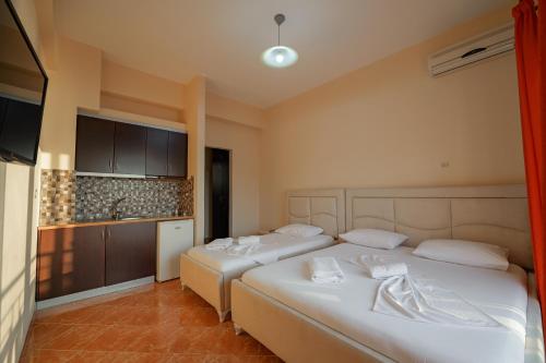 Katil atau katil-katil dalam bilik di Unico ApartHotel