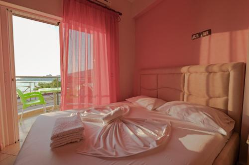 Katil atau katil-katil dalam bilik di Unico ApartHotel