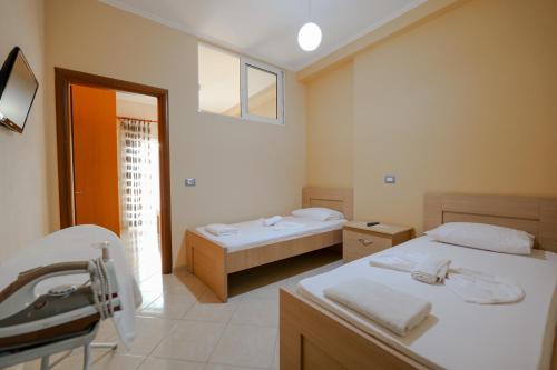 Katil atau katil-katil dalam bilik di Unico ApartHotel