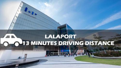 a building with a sign that reads laault minutes driving distance at Seeds Hotel Chow Kit in Kuala Lumpur