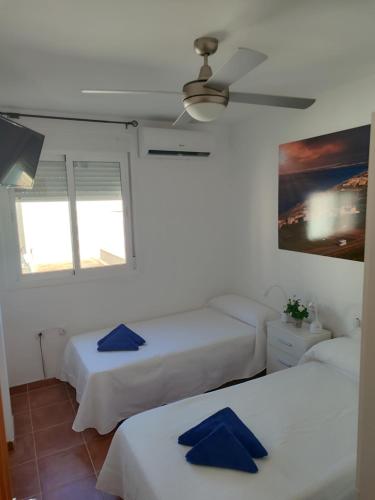 Postel nebo postele na pokoji v ubytování Apartamento El Flamenco Azul Cabo de Gata