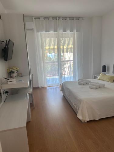 Ένα ή περισσότερα κρεβάτια σε δωμάτιο στο BnB Nuova Vita