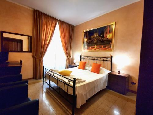 Кровать или кровати в номере Maestoso Appartamento Turistico