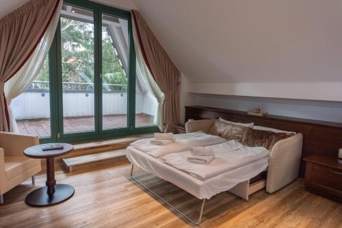 Ένα ή περισσότερα κρεβάτια σε δωμάτιο στο Hotel Restaurant Auerhahn
