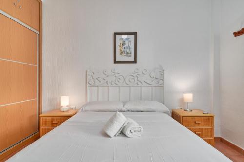 Ένα ή περισσότερα κρεβάτια σε δωμάτιο στο Carabeo 23- Acceso a la Playa