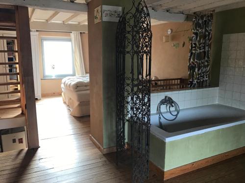 Cama o camas de una habitación en « Le LoMa » Ancienne fermette