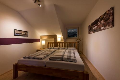 Llit o llits en una habitació de Ferienwohnung Kupfer