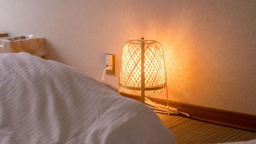 Кровать или кровати в номере marugame stop - Vacation STAY 50031v