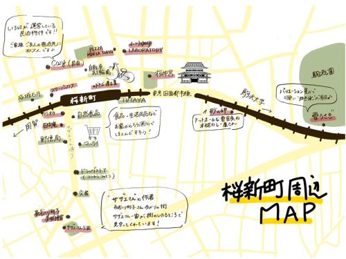 a map of a city with many signs at コージーイン 東京桜新町 in Tokyo