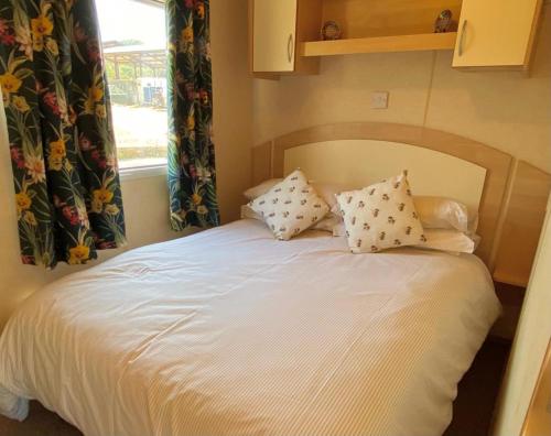 Postel nebo postele na pokoji v ubytování Rose Corner