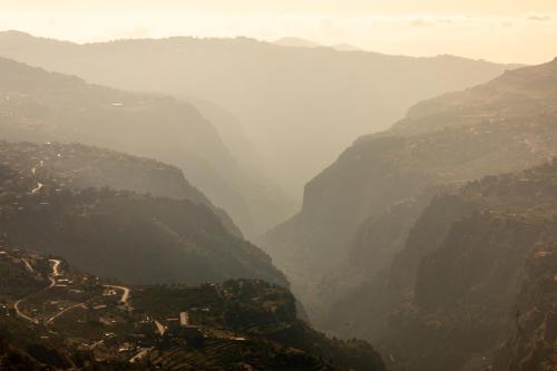 a view of a valley in a mountain range at Le Cedrus Hotel in Al Arz
