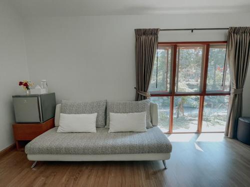 Χώρος καθιστικού στο Tippaya Villa