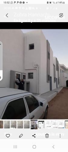 a picture of a car parked in front of a building at Residence djerba 3 in Houmt Souk