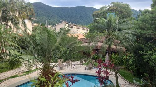 マレシアスにあるCondominio Pousada North Shore Maresias Studios p 2 3 e 4 pessoas 2 quadras da praia mini cozinha completa tv ar cond wifi estacionamento roupa de cama e banhoのギャラリーの写真