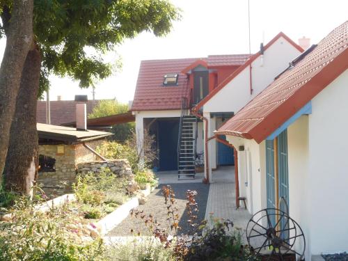 a view of the house from the garden at Penzión Záruby in Smolenice