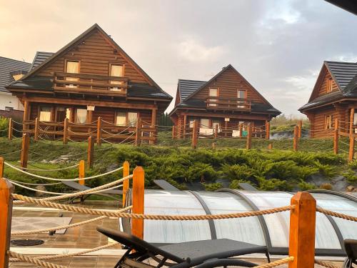 Zahrada ubytování Domki Zagroda Domek z bala z basenem & sauna & balia z hydromasażem