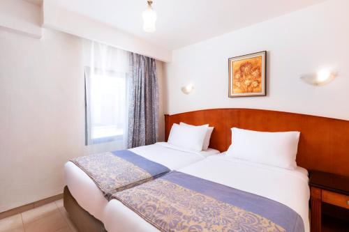 Albatros Sharm Resort - By Pickalbatrosにあるベッド