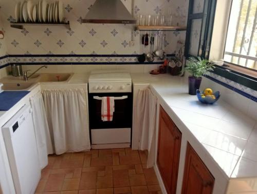 Dapur atau dapur kecil di FINCA EL ROMERO, Finca a 15 minutos de Sevilla