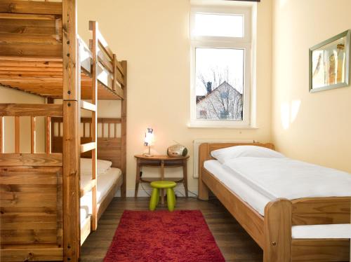 Postel nebo postele na pokoji v ubytování Ostsee Residenz Meeresblick Strandblick