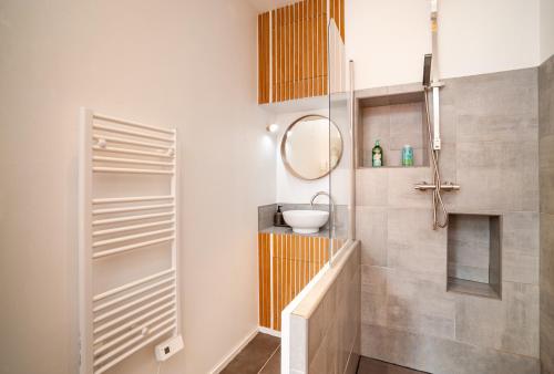 Kúpeľňa v ubytovaní Appartement cosy NANCY