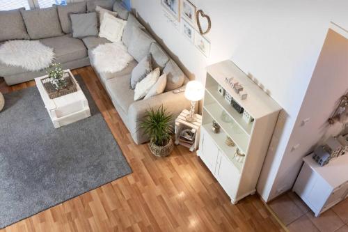 an overhead view of a living room with a couch at Arctic Circle Home close to Santa`s Village in Rovaniemi