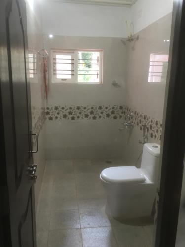 Koupelna v ubytování Shilpa Vikas Homestay
