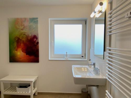 Koupelna v ubytování Ferienwohnung ZOOM - Stilvolle Wohnung mit Balkon in ruhiger Umgebung