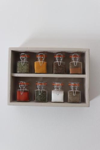 a shelf filled with lots of different types of food at Apartmán MEZI DUBY in Osečná