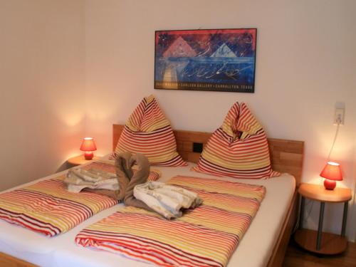 Ένα ή περισσότερα κρεβάτια σε δωμάτιο στο Ferienwohnung Limone