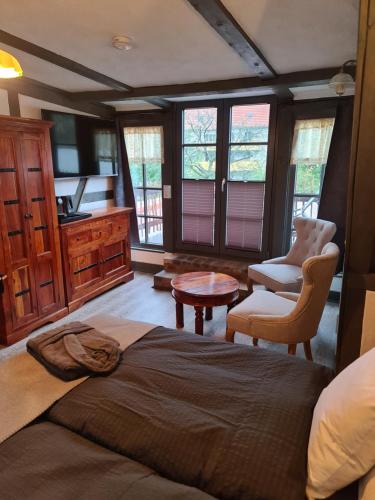 Posezení v ubytování Hotel b&b altes hinterhäusel