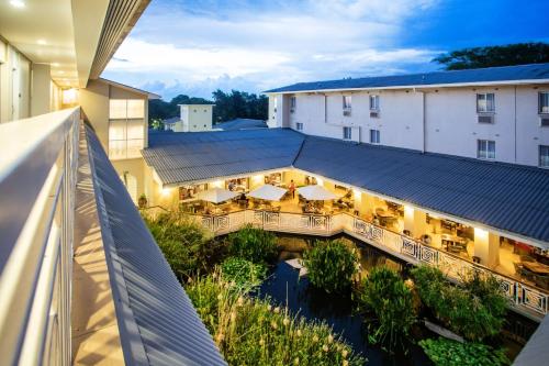 an overhead view of a hotel with a balcony at Southern Sun Ridgeway Lusaka in Lusaka