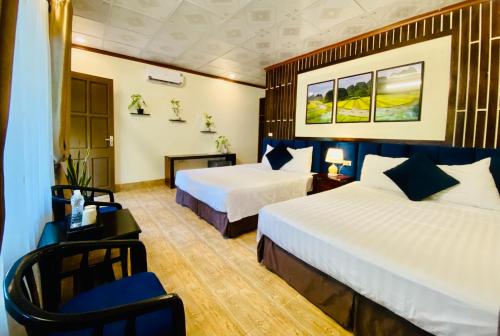 Ένα ή περισσότερα κρεβάτια σε δωμάτιο στο Tam Coc Little river Bungalow