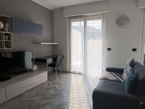 Televízia a/alebo spoločenská miestnosť v ubytovaní GF Holiday Suite