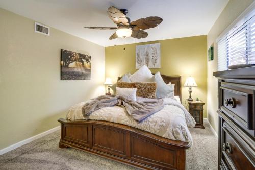 a bedroom with a bed and a ceiling fan at The Painted Pony Condo with Pool and Gym Access! in Sedona